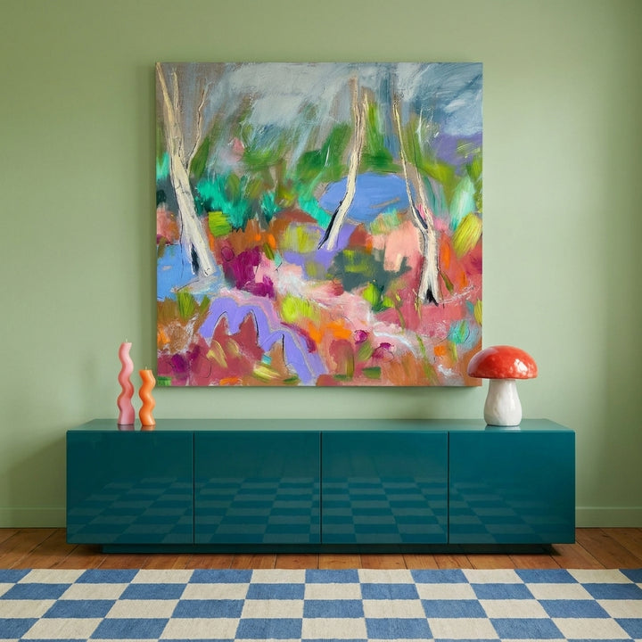 Stretched canvas wall art styled on the wall in a colourful eclectic living room