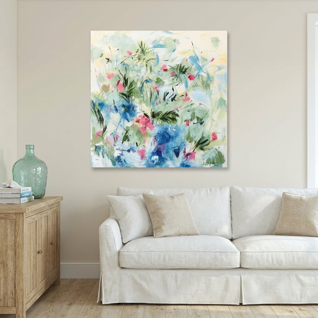 Stretched canvas wall art styled on the wall in a coastal living room