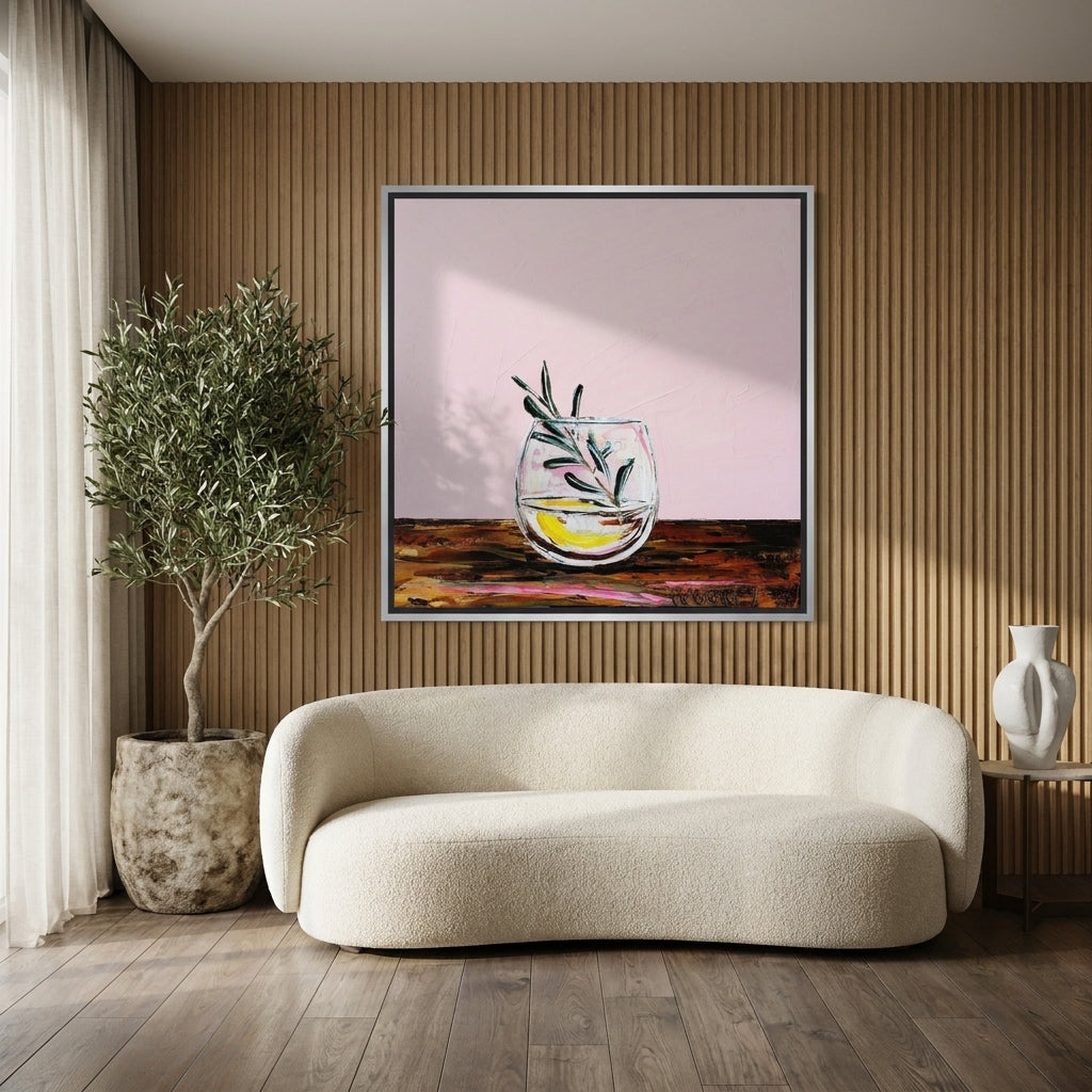 Canvas wall art with a silver leaf surround styled on the wall in a luxe living room