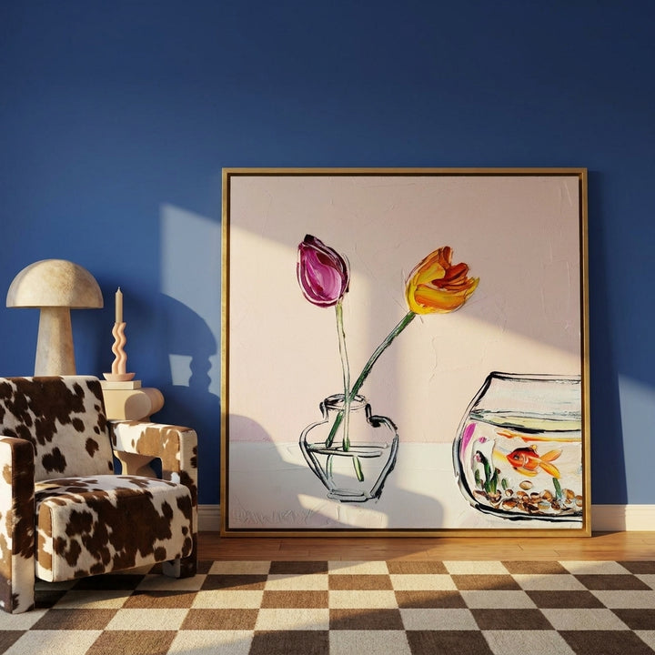 Oversized statement canvas wall art with a gold leaf surround leaning against the wall in a colourful eclectic dining room