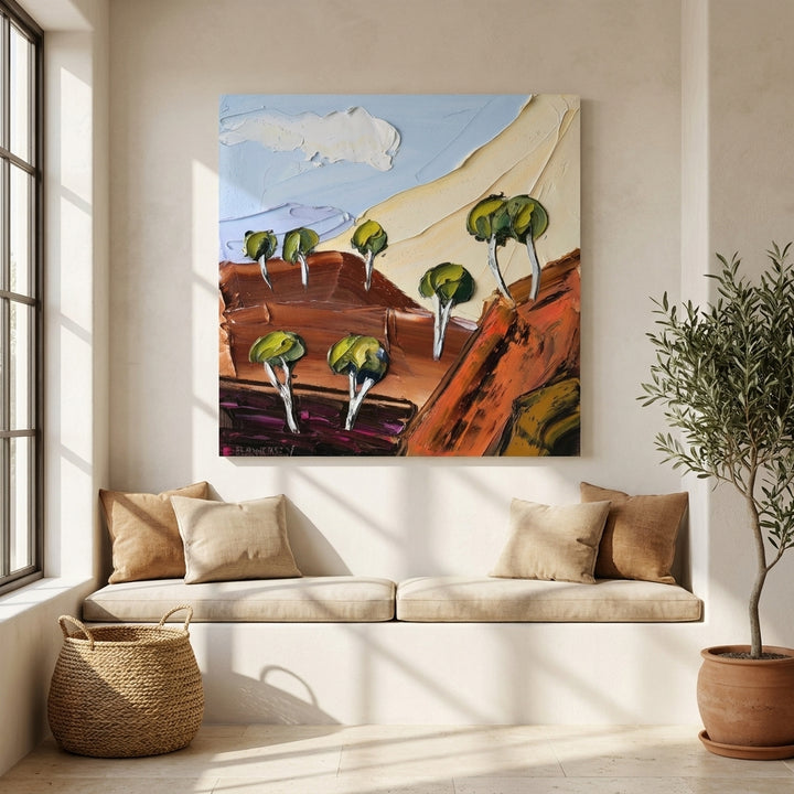 Stretched canvas wall art styled on the wall in a Mediterranean living room