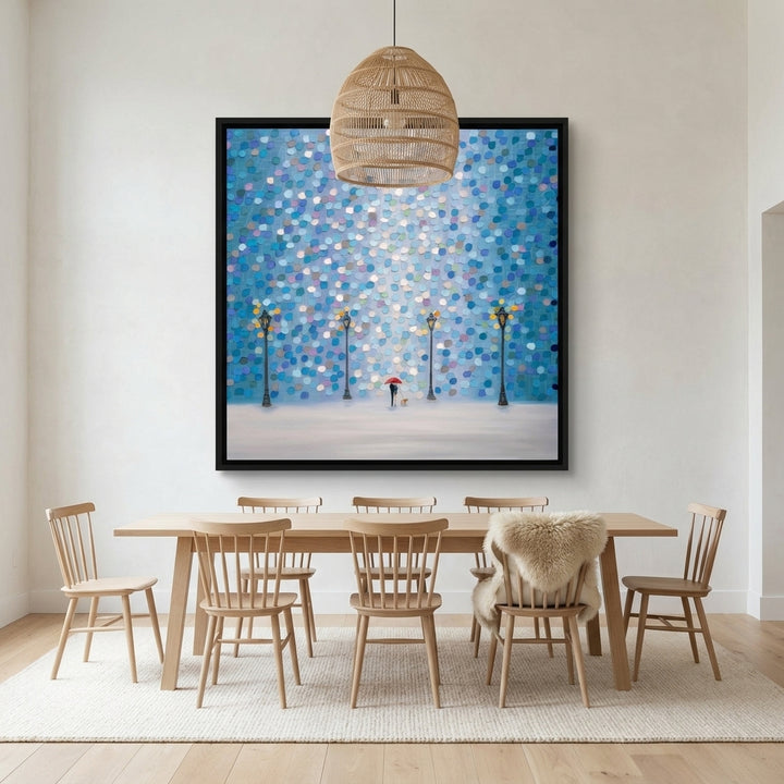 Oversized statement canvas wall art with a black surround styled on the wall in a bright Scandinavian dining room