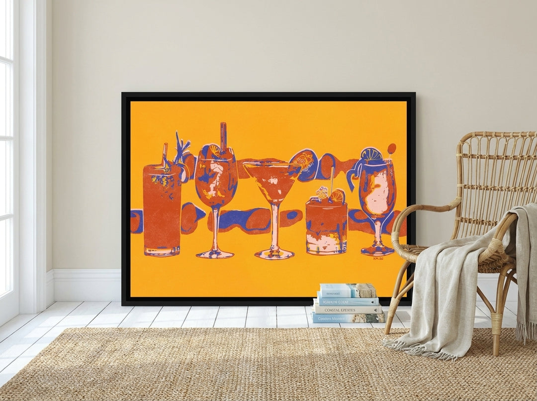 Canvas wall art with a black surround leaning against the wall in a coastal kitchen