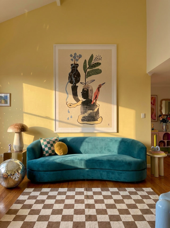 Oversized statement modern wall art print styled on the wall in a colourful eclectic living room