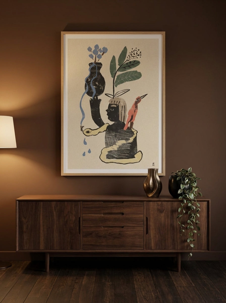 Modern wall art print styled on the wall in a moody living room