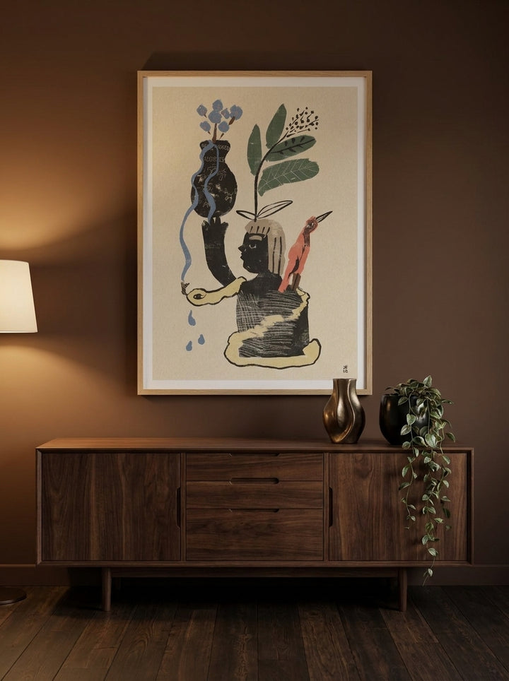 Modern wall art print styled on the wall in a moody living room