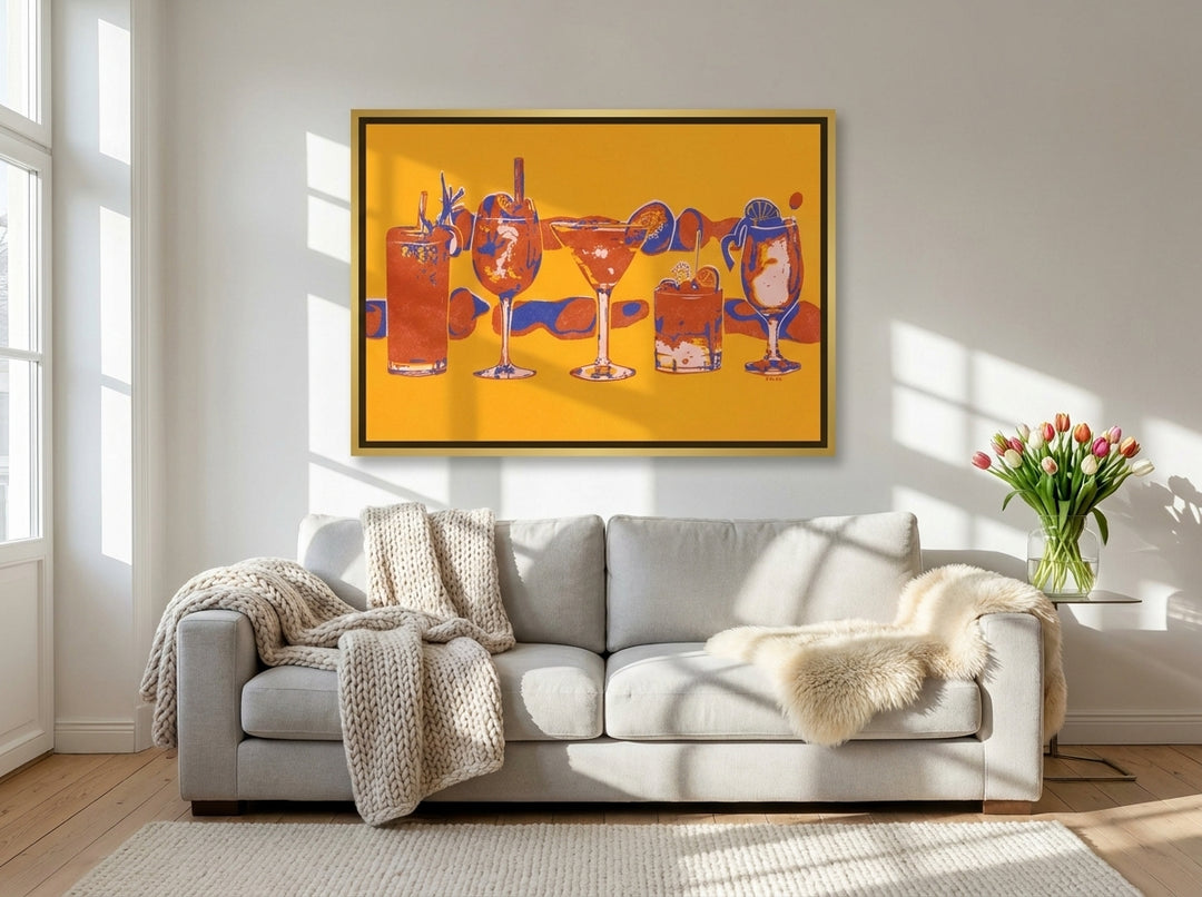 Canvas wall art with a gold leaf surround styled on the wall in a bright Scandinavian living room