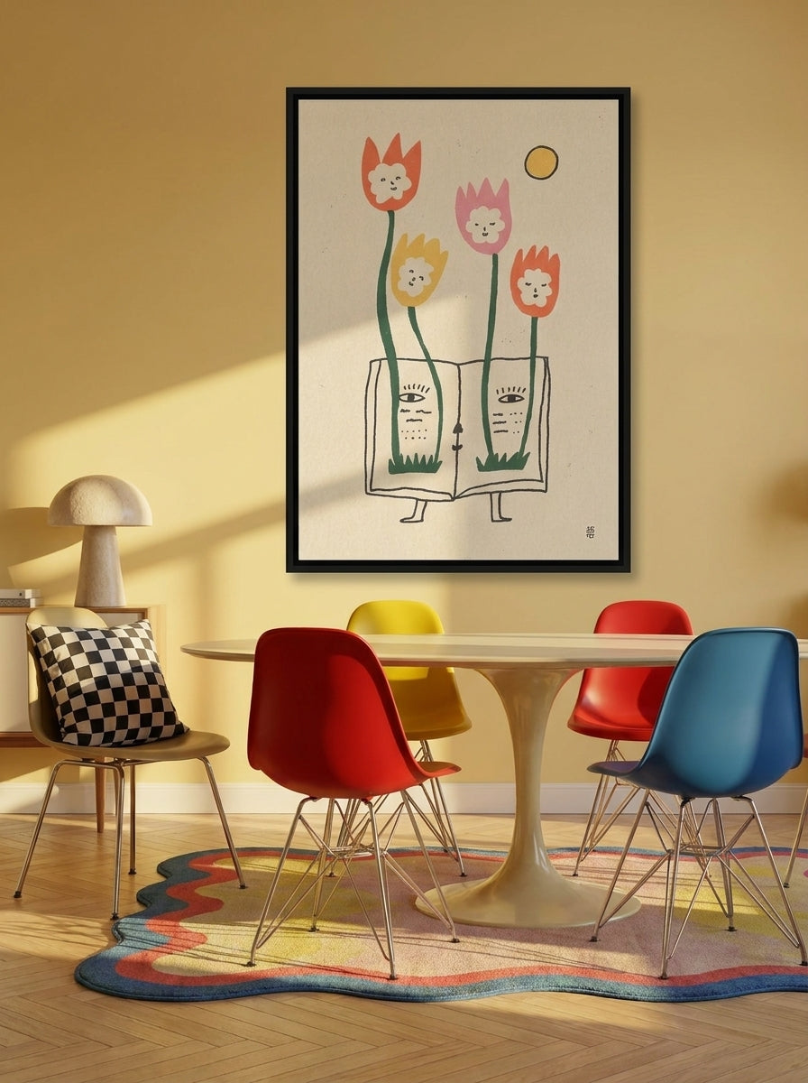 Canvas wall art with a black surround styled on the wall in a colourful eclectic dining room