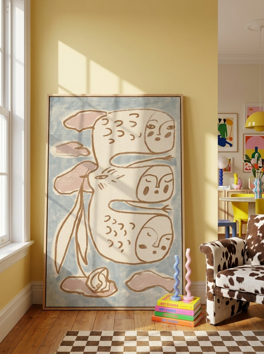 Oversized statement canvas wall art with a natural timber surround leaning against the wall in a colourful eclectic dining room