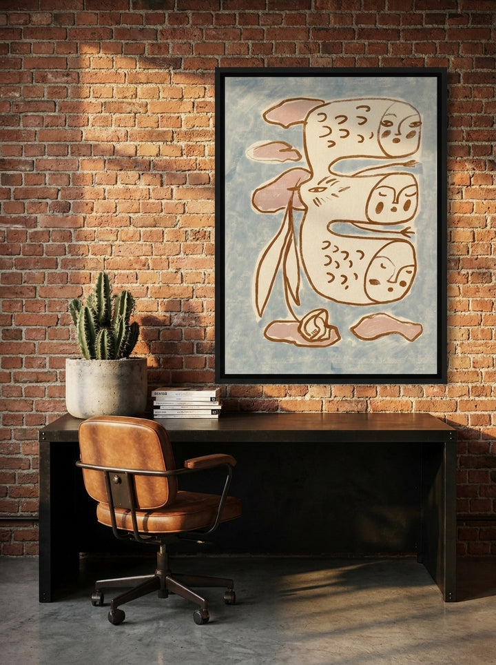 Canvas wall art with a black surround styled on the wall in an industrial loft home office