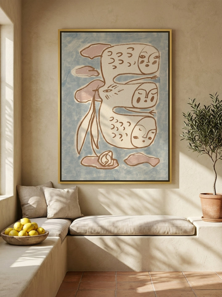 Oversized statement canvas wall art with a gold leaf surround styled on the wall in a Mediterranean living room
