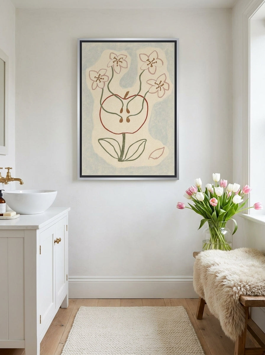 Canvas wall art with a silver leaf surround styled on the wall in a bright Scandinavian bathroom