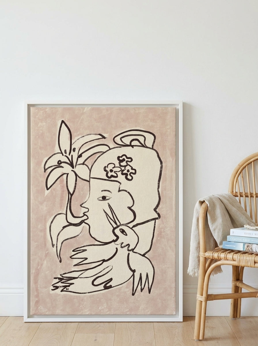 Canvas wall art with a white surround leaning against the wall in a coastal bedroom