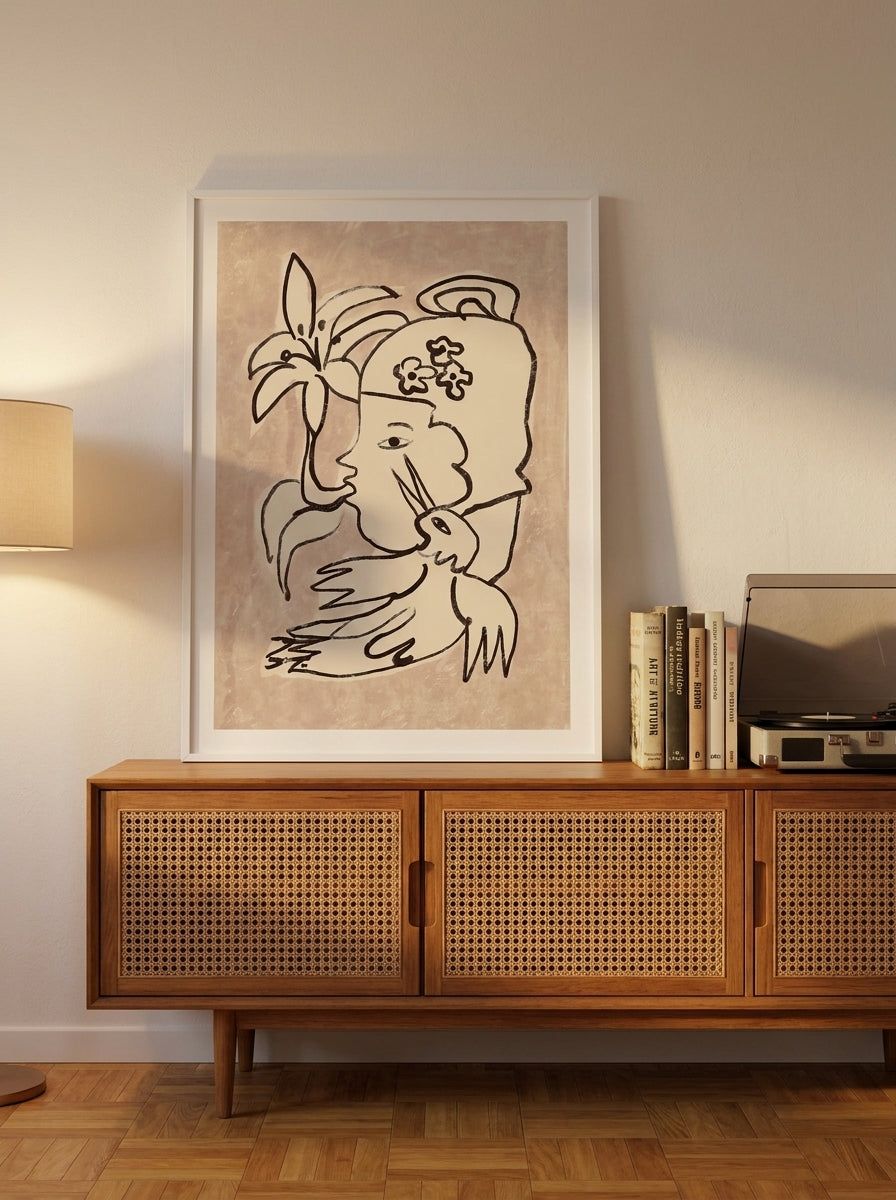 Modern wall art print standing on a sideboard in a mid-century bedroom
