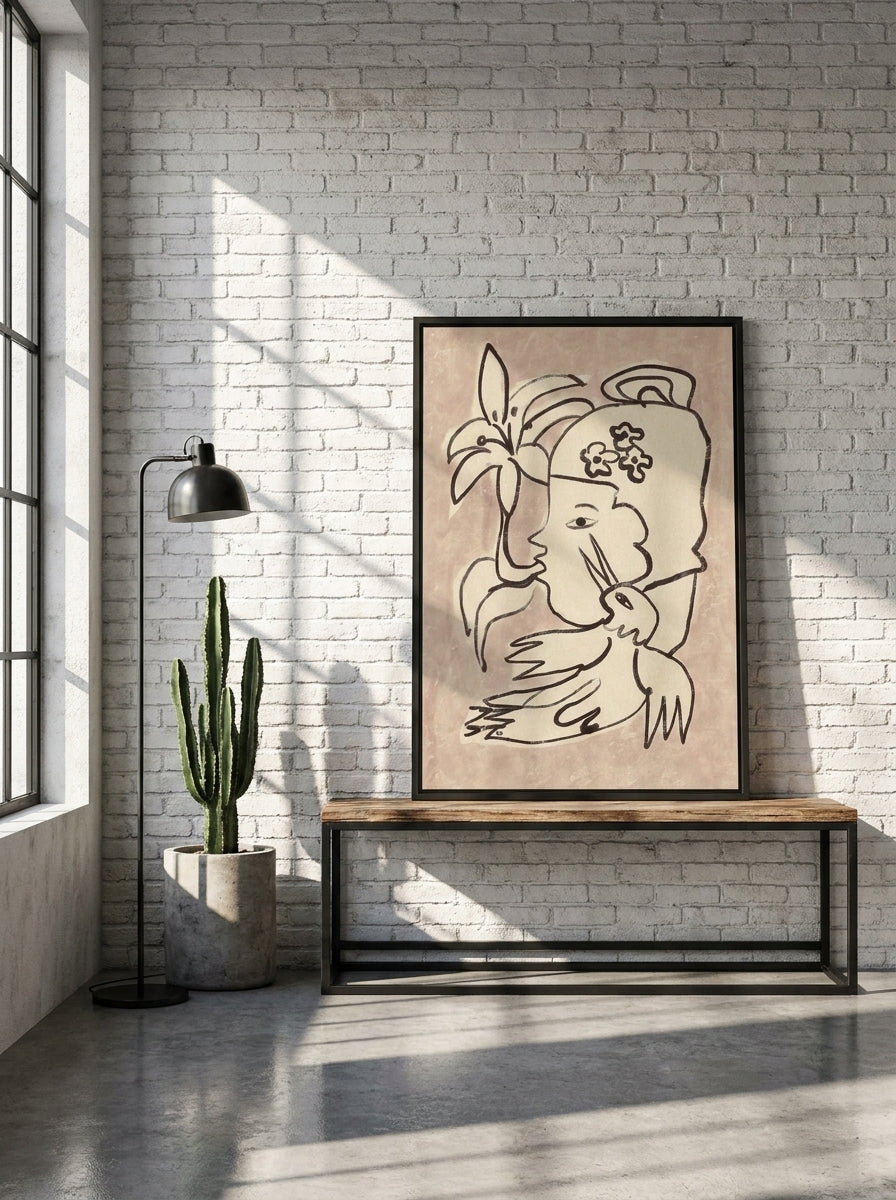 Canvas wall art with a black surround standing on a console in an industrial loft living room