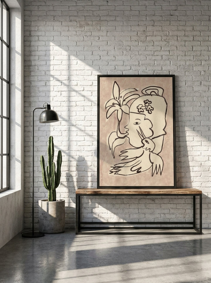 Canvas wall art with a black surround standing on a console in an industrial loft living room