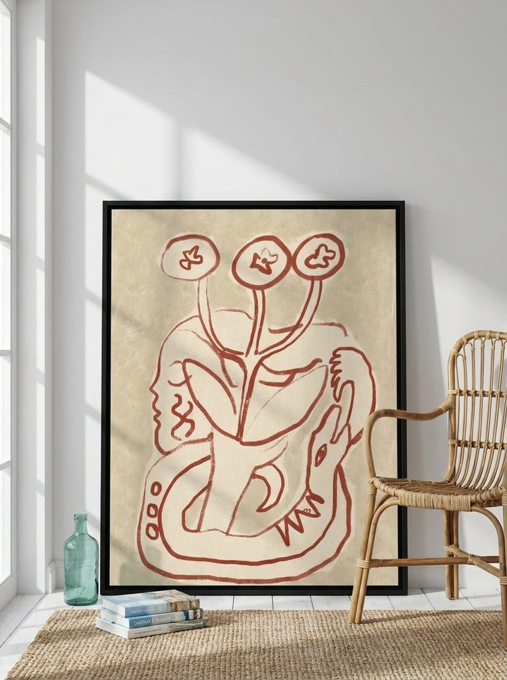 Canvas wall art with a black surround leaning against the wall in a coastal living room