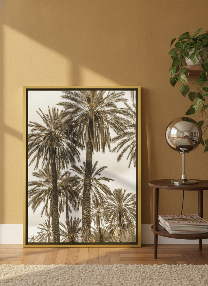 Canvas wall art with a gold leaf surround leaning against the wall in a retro 70s home office