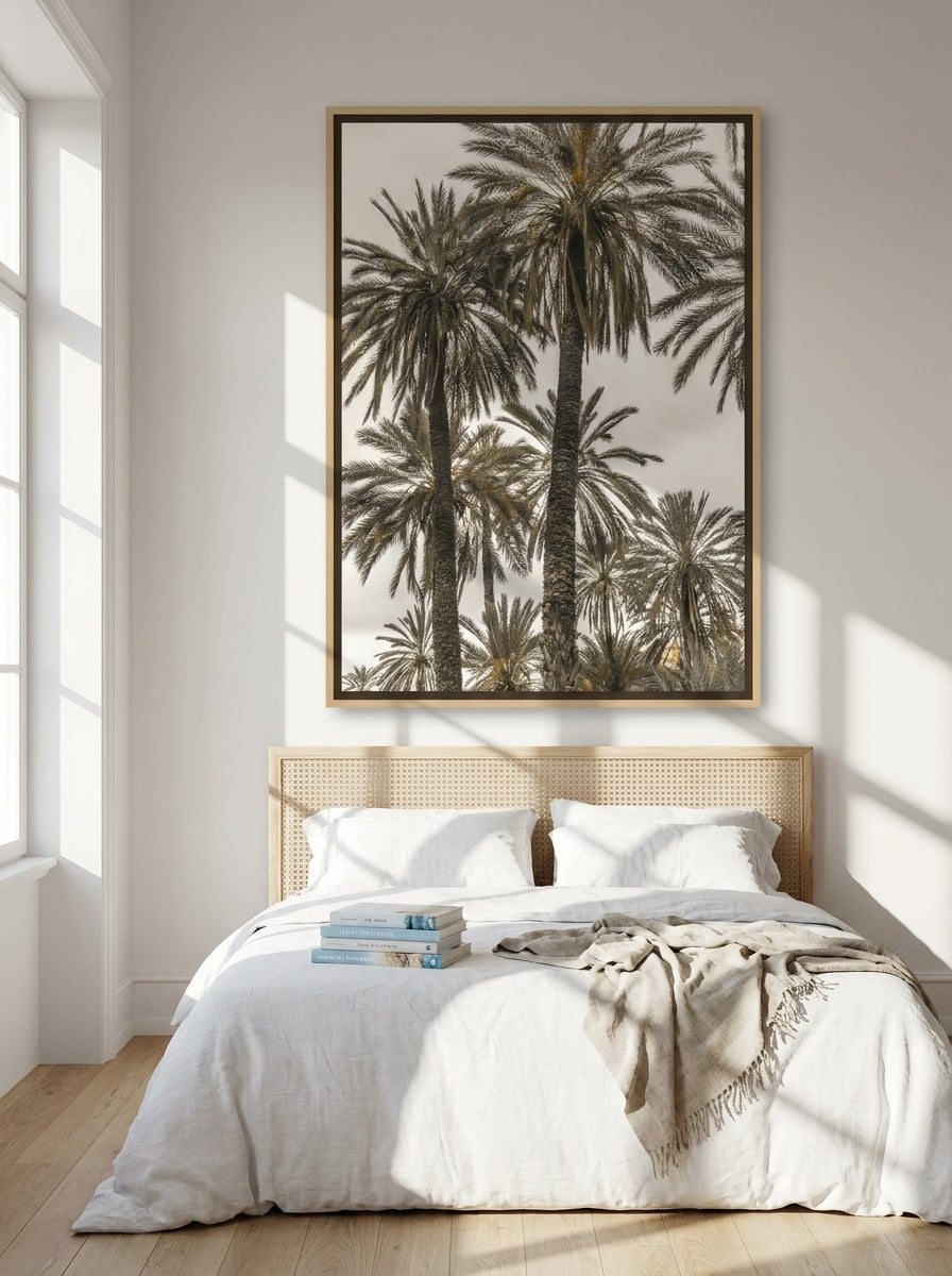 Oversized statement canvas wall art with a natural timber surround styled on the wall in a coastal bedroom