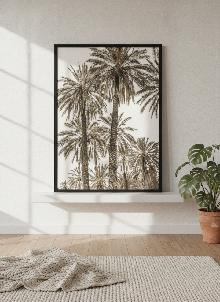Modern wall art print standing on a shelf in a bright Scandinavian living room