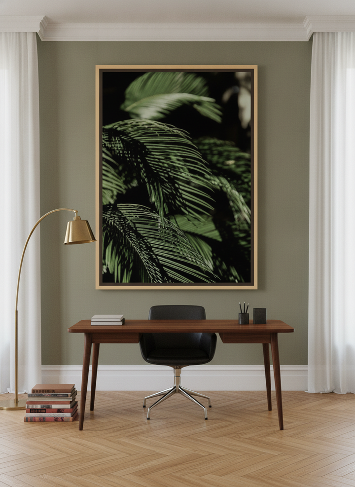 Oversized statement canvas wall art with a natural timber surround styled on the wall in a mid-century home office