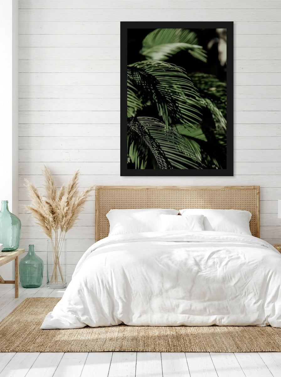 Oversized statement modern wall art print styled on the wall in a coastal bedroom