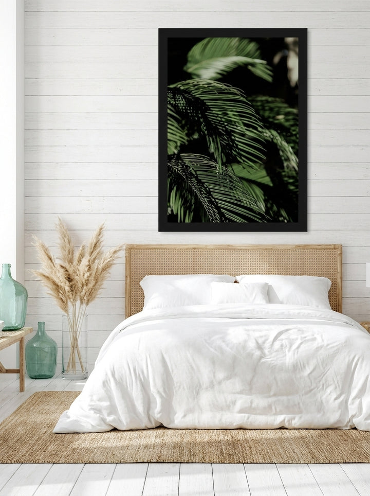 Oversized statement modern wall art print styled on the wall in a coastal bedroom