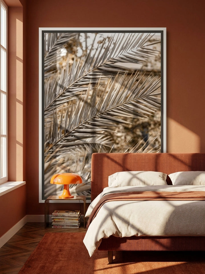 Canvas wall art with a white surround styled on the wall in a retro 70s bedroom