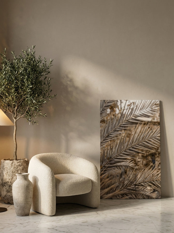 Stretched canvas wall art leaning against the wall in a luxe bathroom
