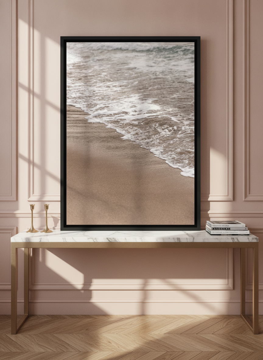 Canvas wall art with a black surround standing on a console in a Parisian bathroom