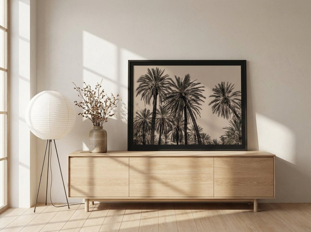 Modern wall art print standing on a sideboard in a warm Japandi dining room