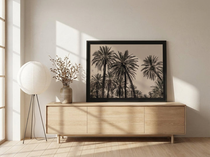 Modern wall art print standing on a sideboard in a warm Japandi dining room