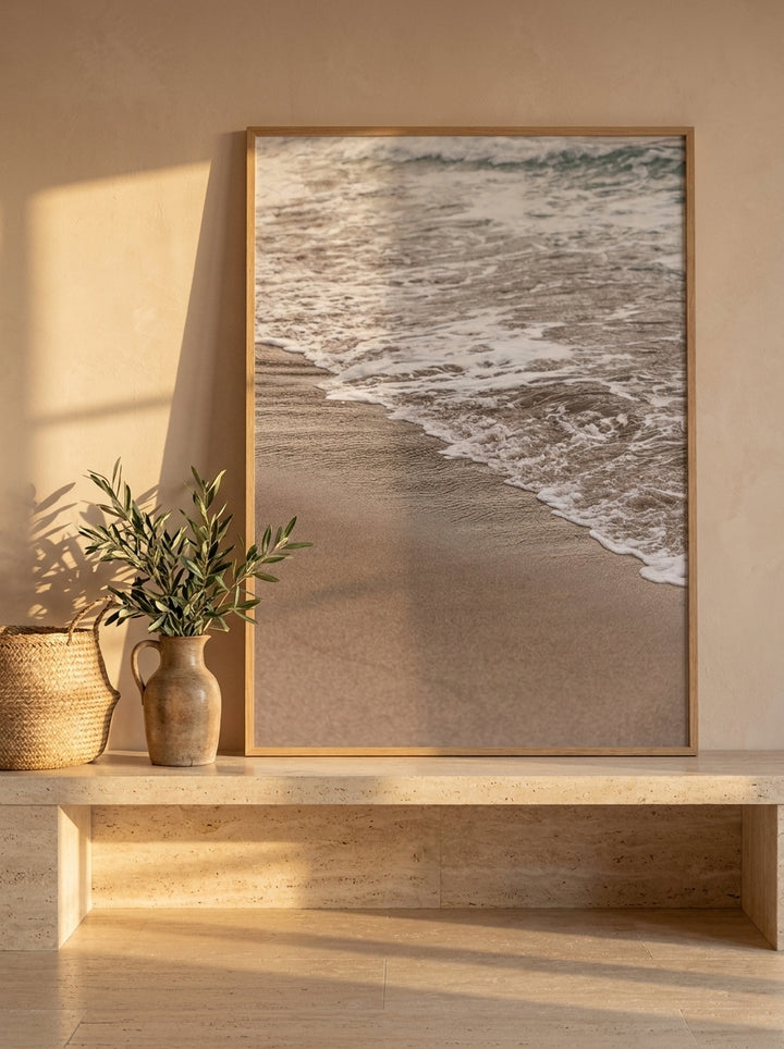 Modern wall art print standing on a console in a Mediterranean bathroom