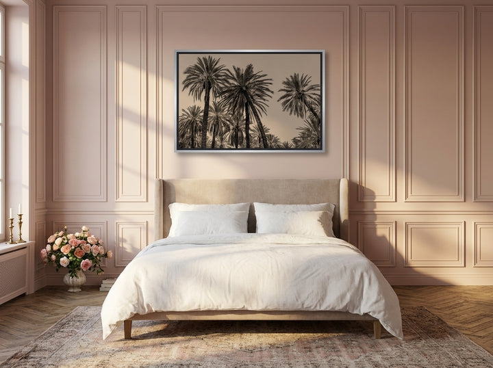 Canvas wall art with a silver leaf surround styled on the wall in a Parisian bedroom