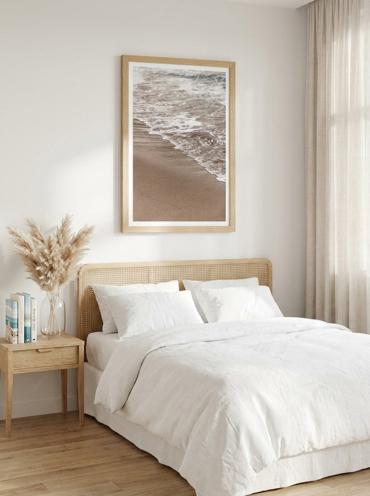 Modern wall art print styled on the wall in a coastal bedroom