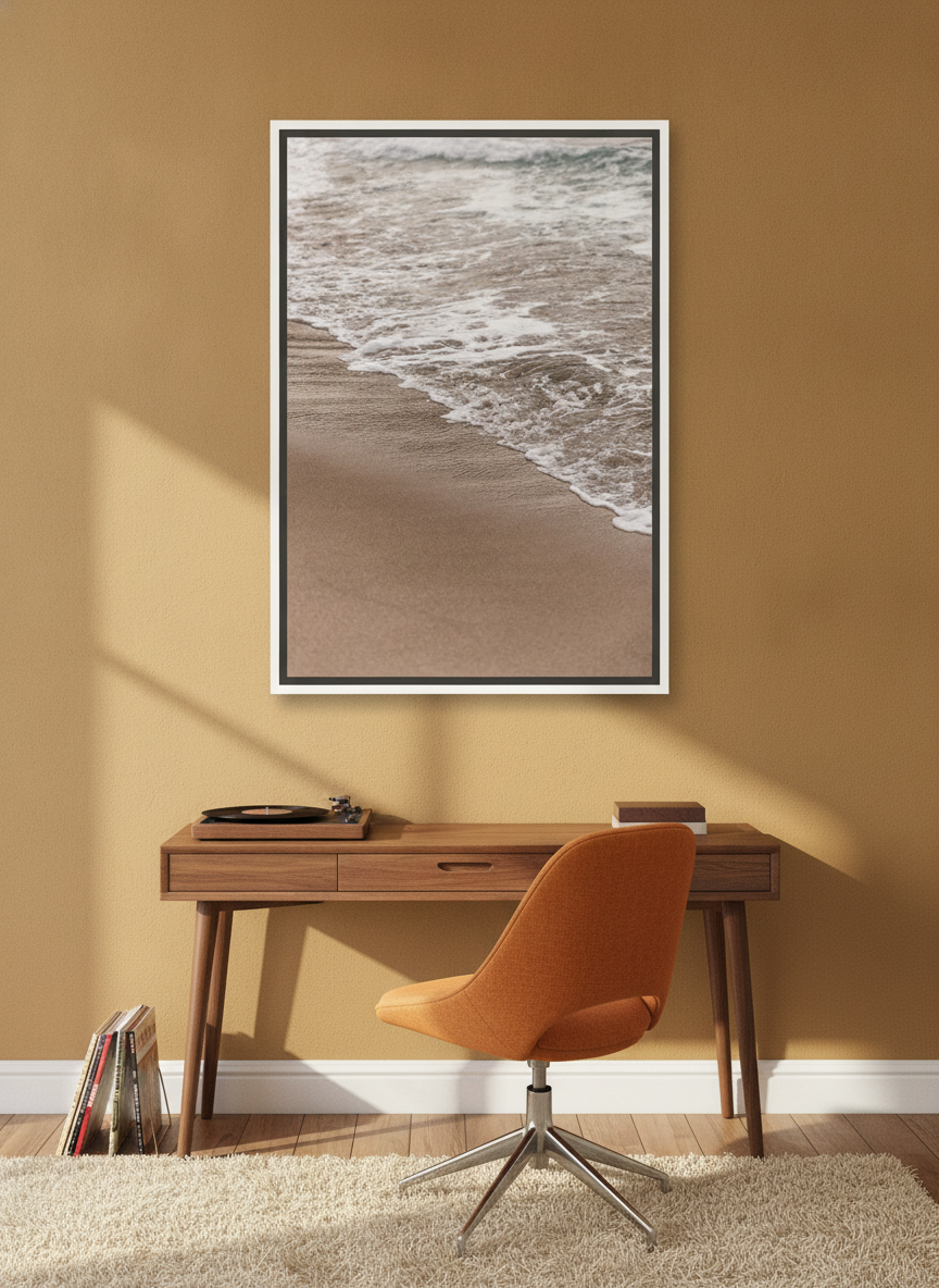 Canvas wall art with a white surround styled on the wall in a retro 70s home office