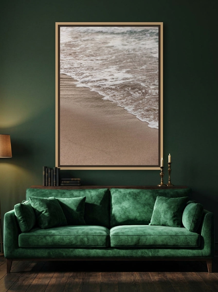 Oversized statement canvas wall art with a natural timber surround styled on the wall in a moody living room