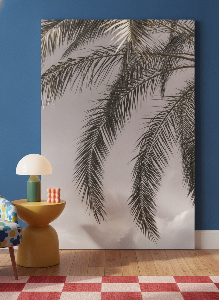 Stretched canvas wall art leaning against the wall in a colourful eclectic bedroom