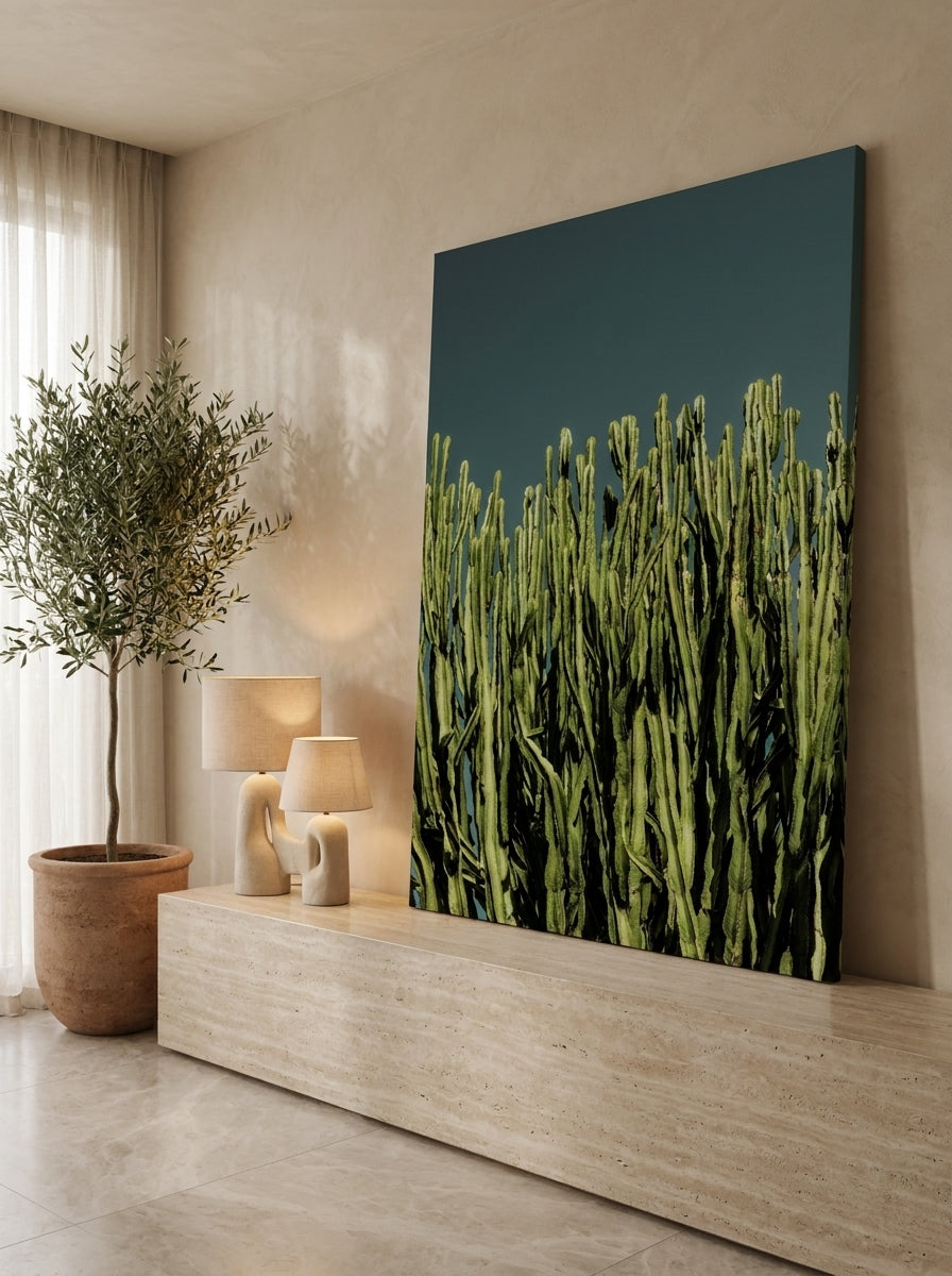 Stretched canvas wall art standing on a console in a luxe home office