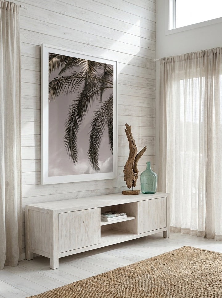Oversized statement modern wall art print styled on the wall in a coastal living room