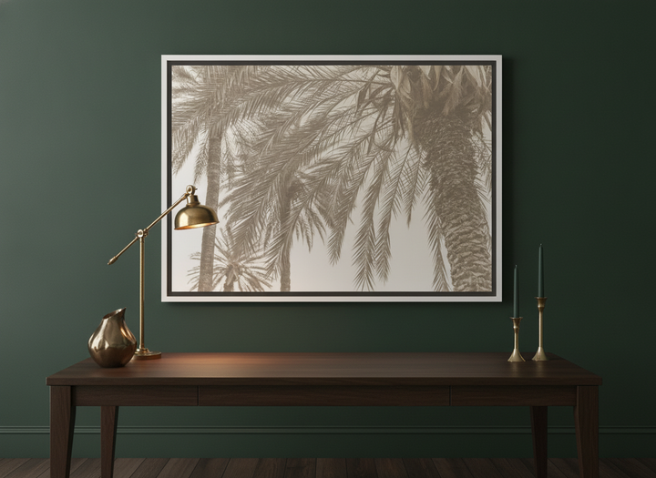 Canvas wall art with a white surround styled on the wall in a moody home office