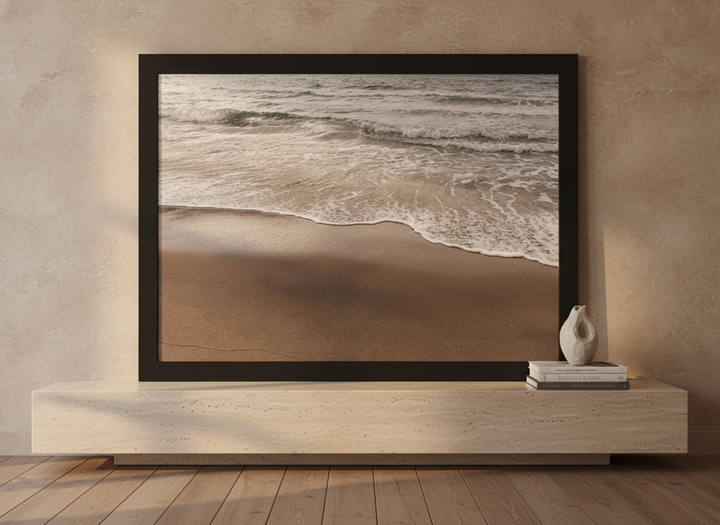 Modern wall art print standing on a console in a luxe home office