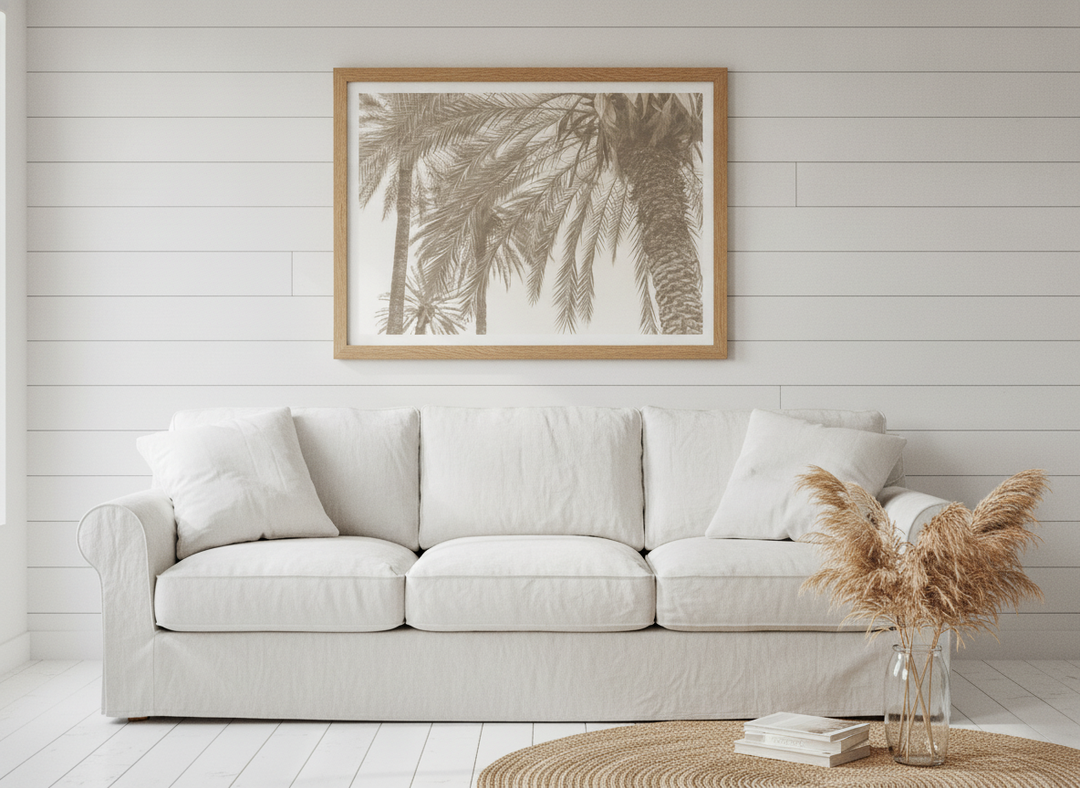 Modern wall art print styled on the wall in a coastal living room