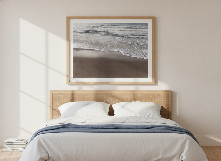 Modern wall art print styled on the wall in a coastal bedroom