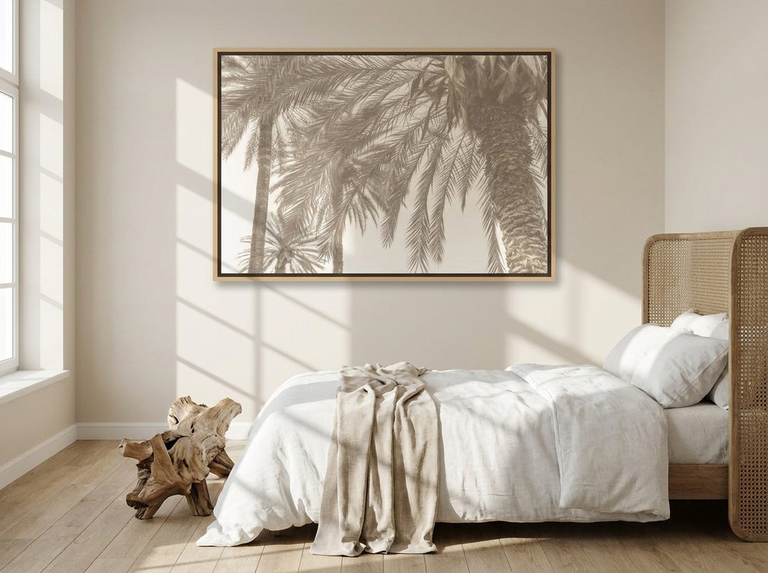 Oversized statement canvas wall art with a natural timber surround styled on the wall in a coastal bedroom