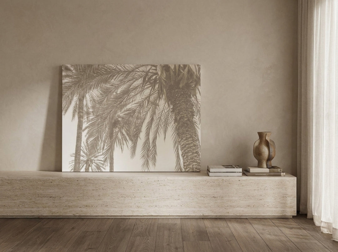 Stretched canvas wall art standing on a console in a luxe bedroom