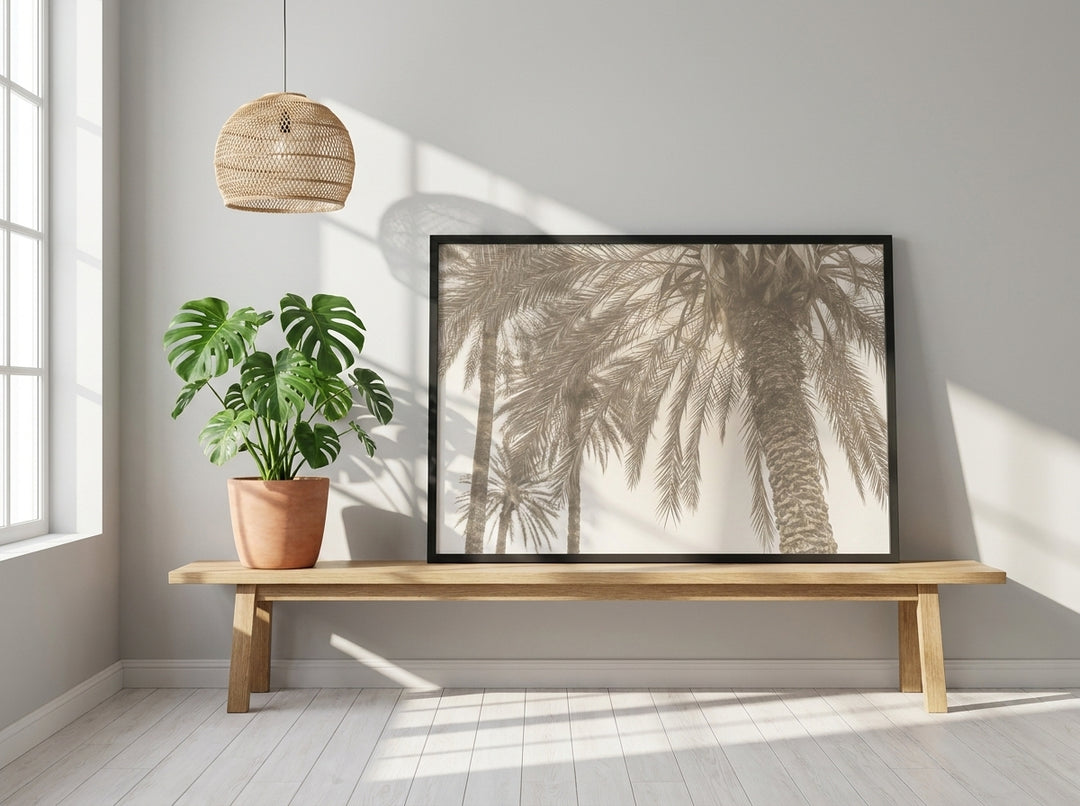 Modern wall art print standing on a bench in a bright Scandinavian home office