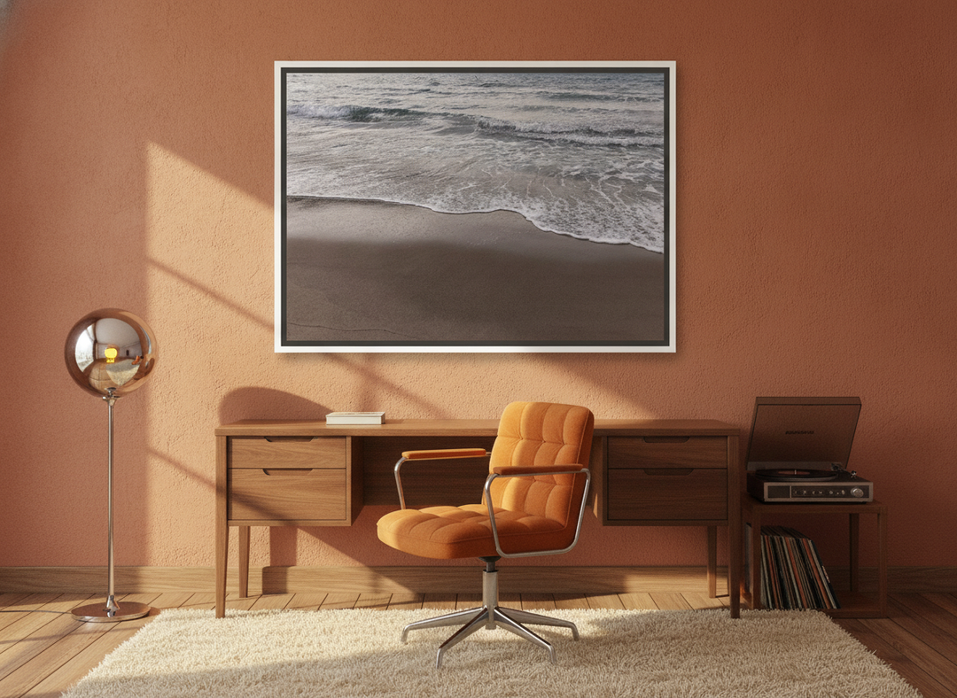 Canvas wall art with a white surround styled on the wall in a retro 70s home office