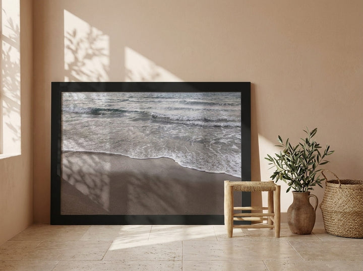 Modern wall art print leaning against the wall in a Mediterranean bedroom