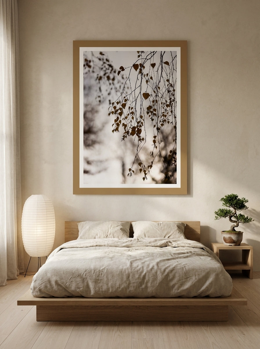 Modern wall art print styled on the wall in a warm Japandi bedroom